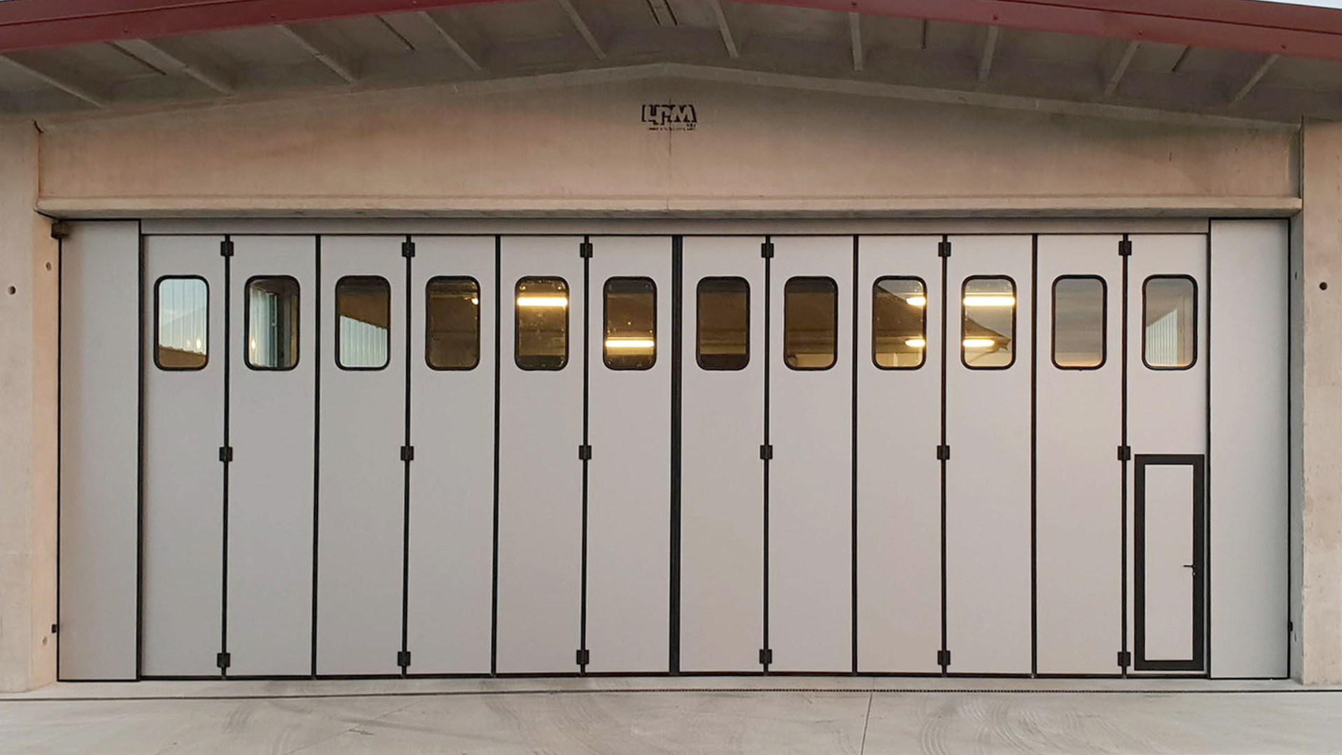 Portone a libro industriale | IRIDIUM DOORS